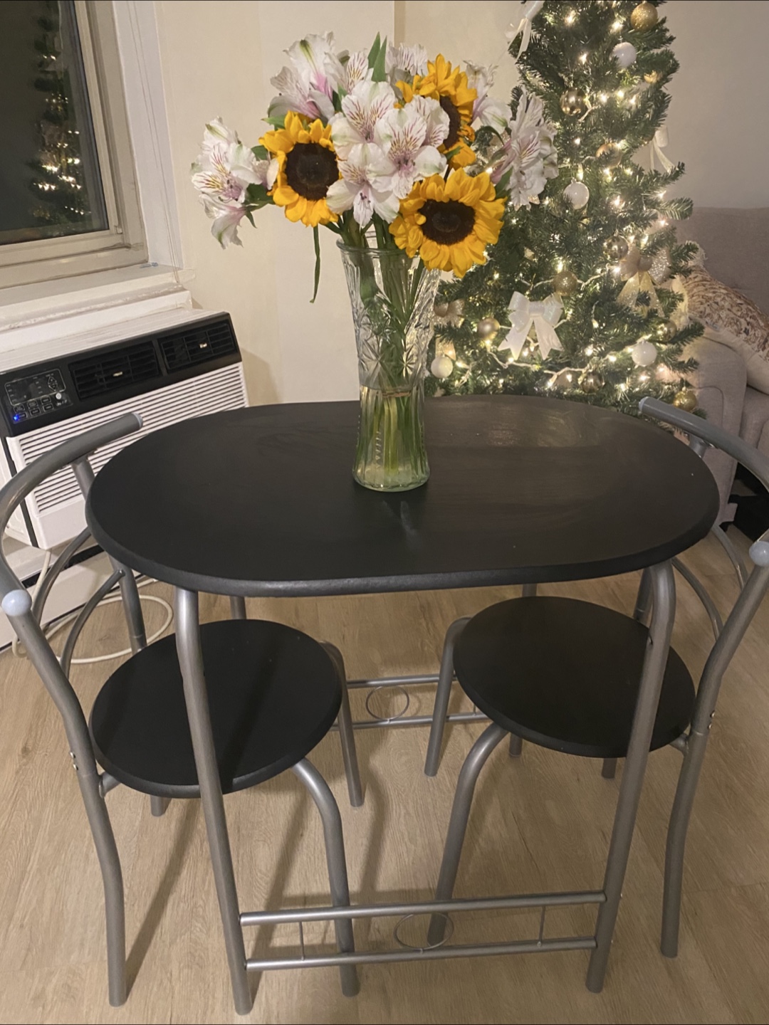 Round Black Table with Two Chairs