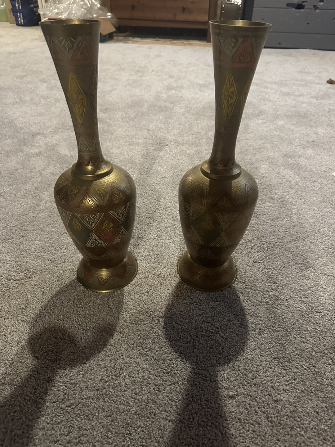 Pair of ornate brass vases