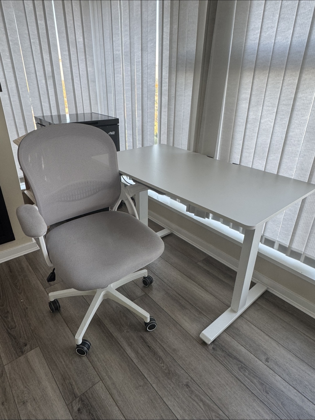 Adjustable standing desk and office chair