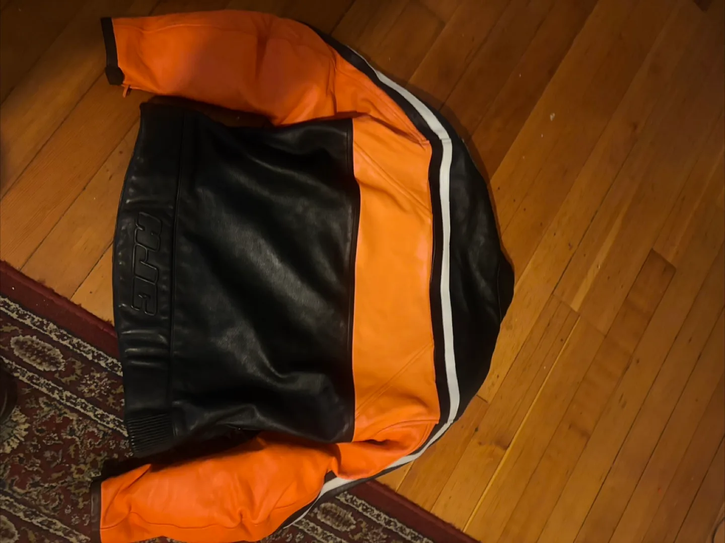 BILT Orange and Black Leather Motorcycle Jacket image indicator(3)