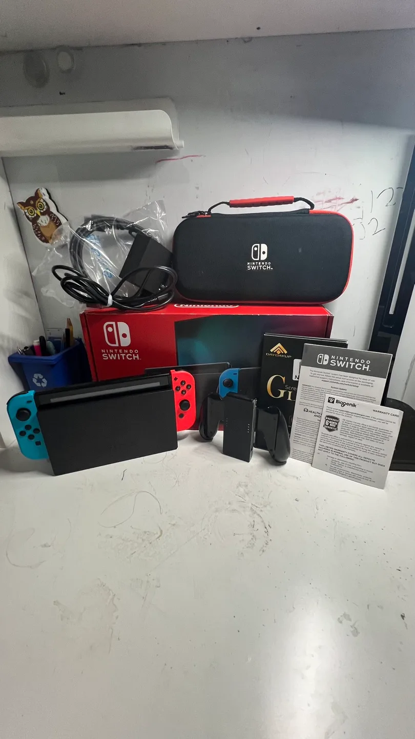 Nintendo Switch with Box + Free Game Bundle thumbnail