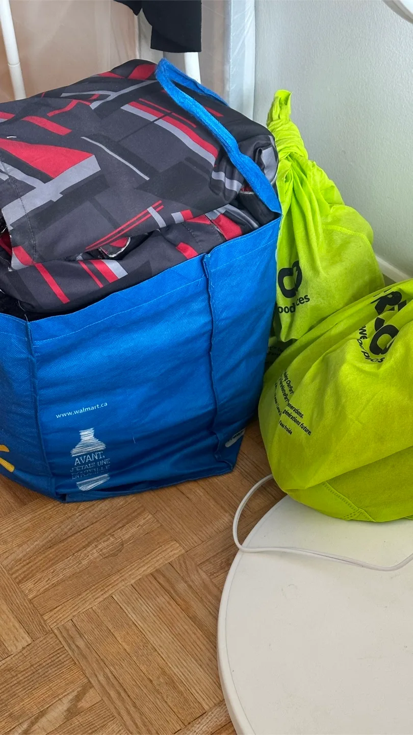 Bag full of kids and woman clothes thumbnail