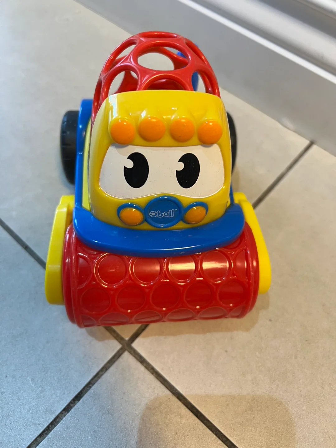 Brightly Coloured Rolling Toy Car thumbnail