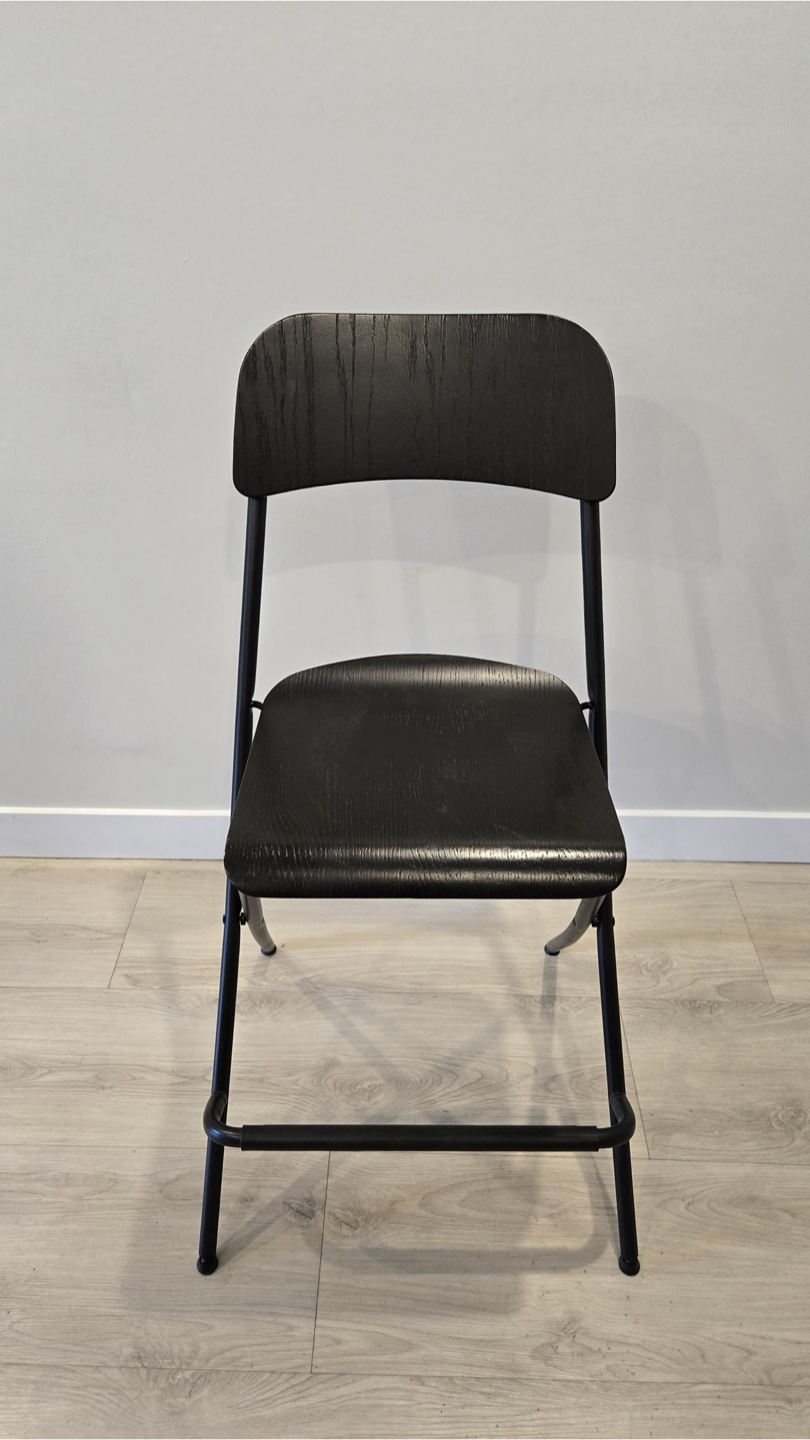 One Black Bar Stool