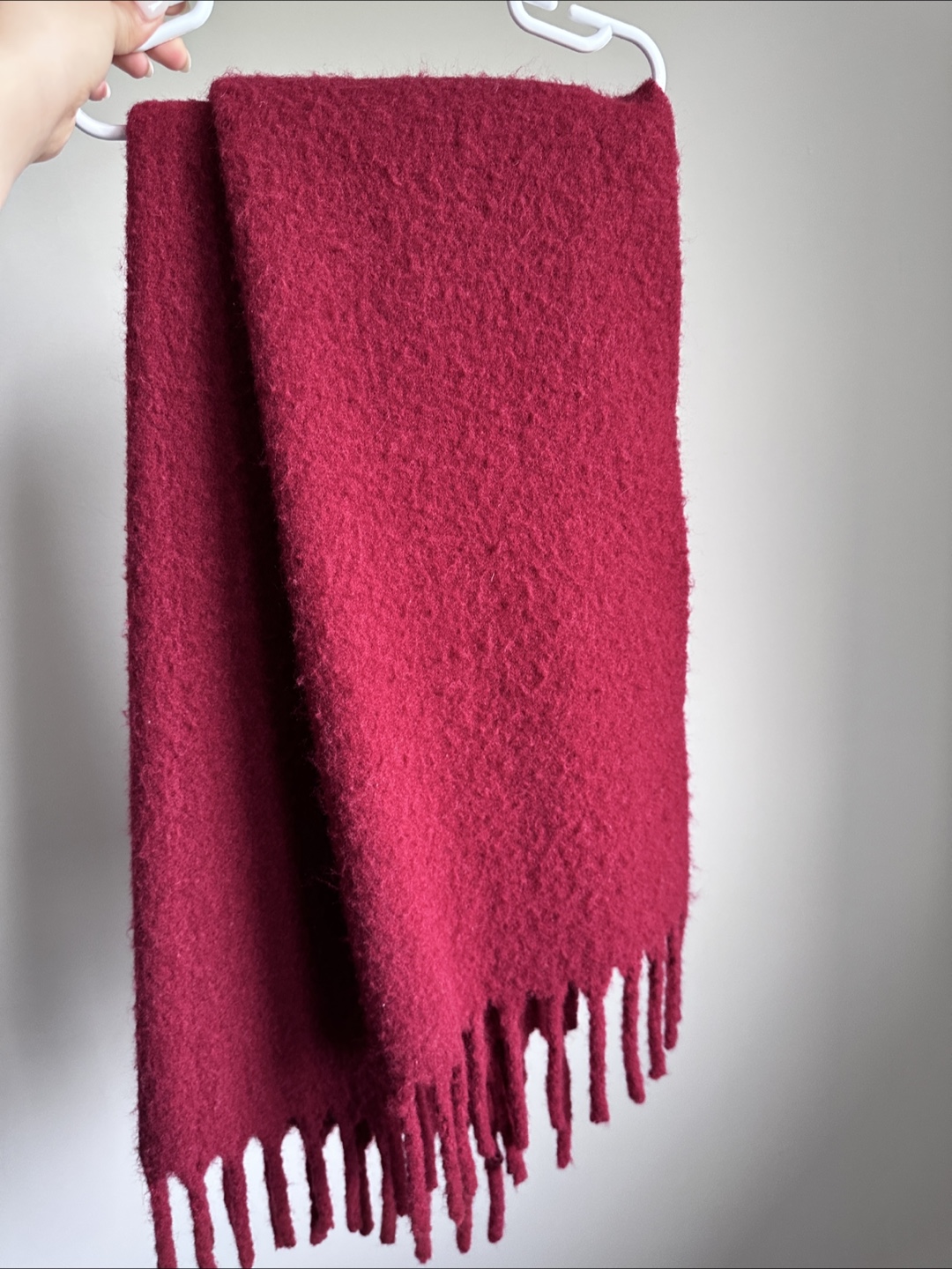 Cozy red scarf with fringe including wool
