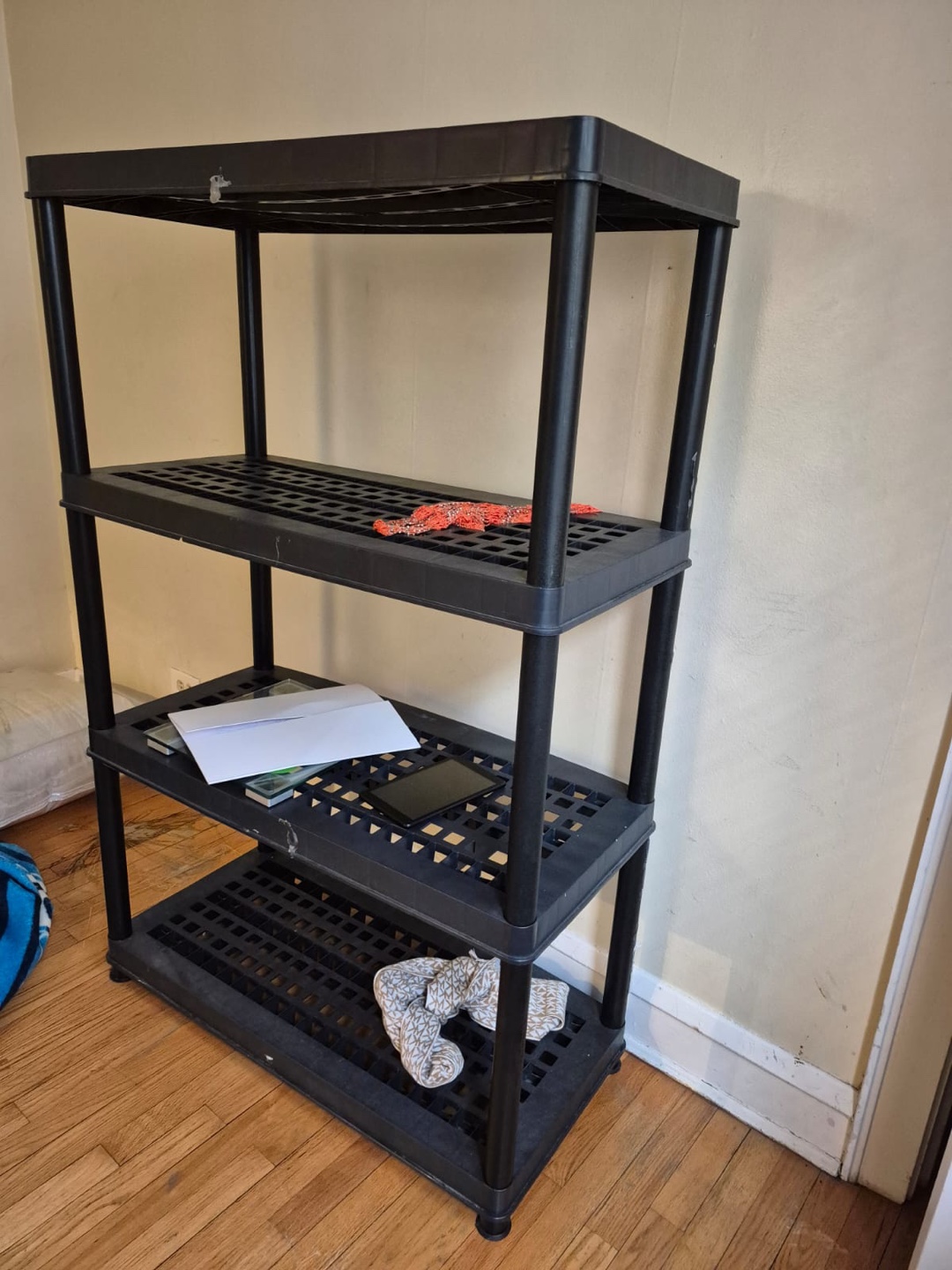 4-Tier Black Plastic Shelving Unit