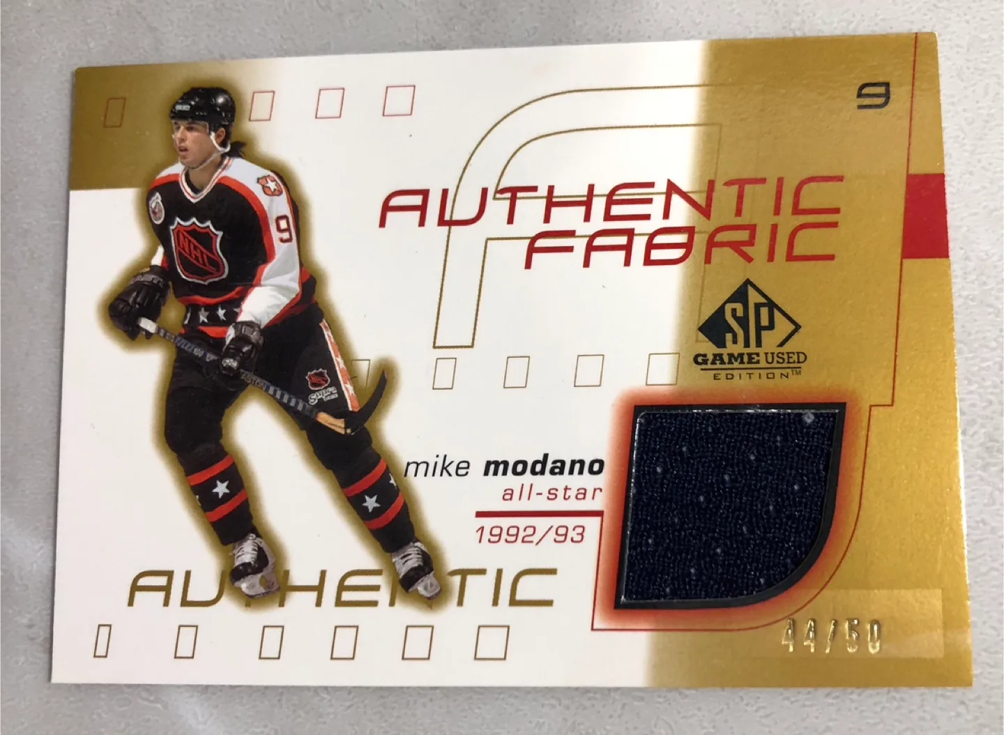 Mike Modano Authentic Fabric GOLD 44/50!! Hockey Card thumbnail