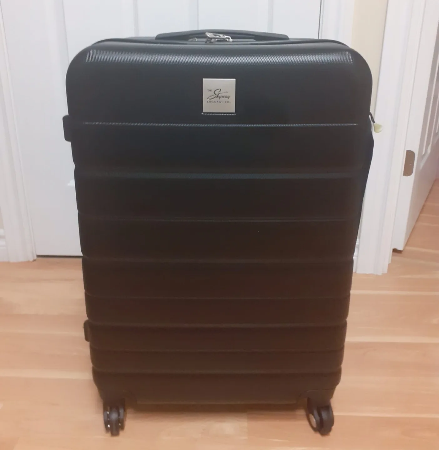 The Skyway Black Rolling Suitcase thumbnail