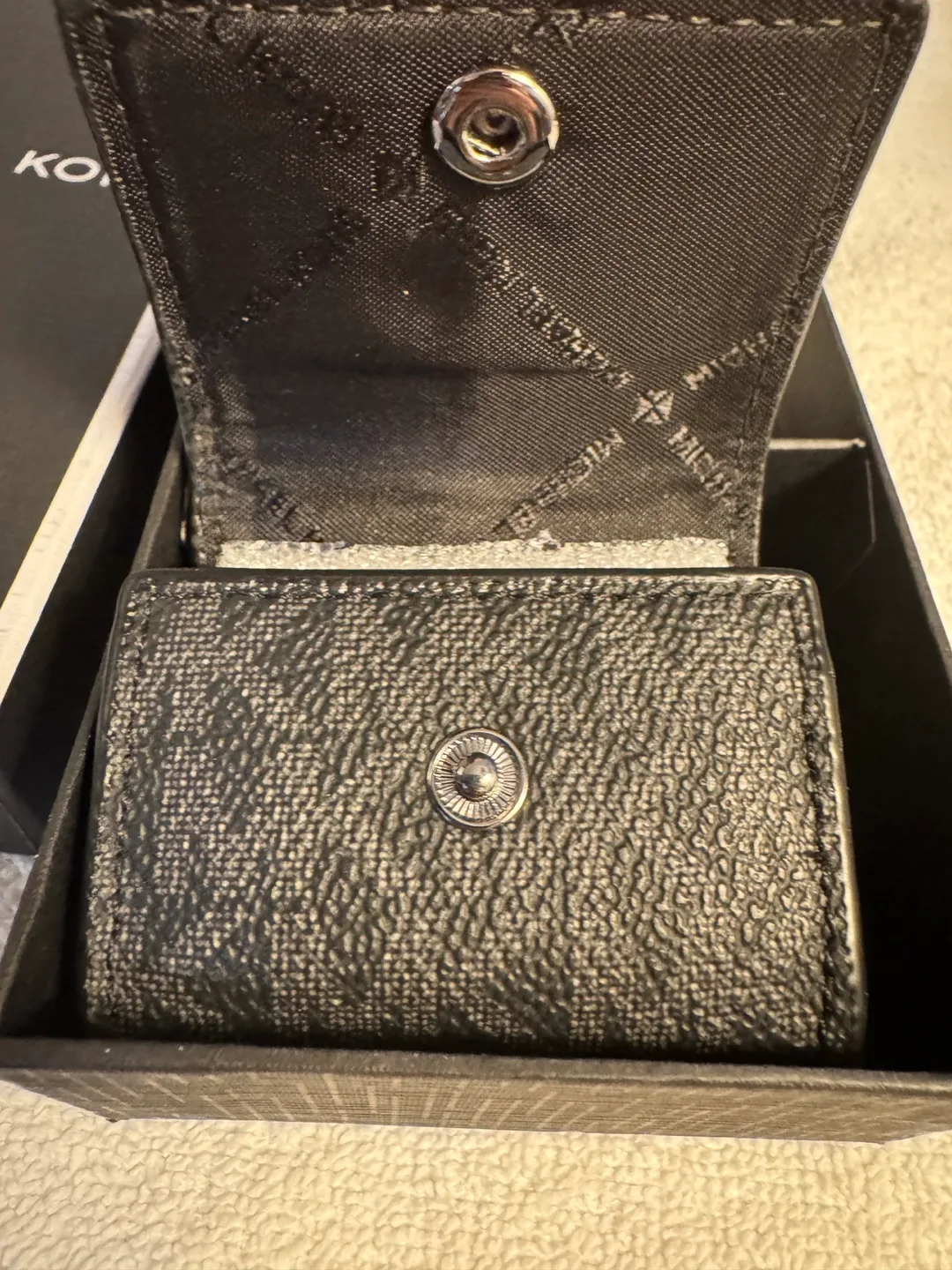 Michael Kors Airpod Case - Black image indicator(3)