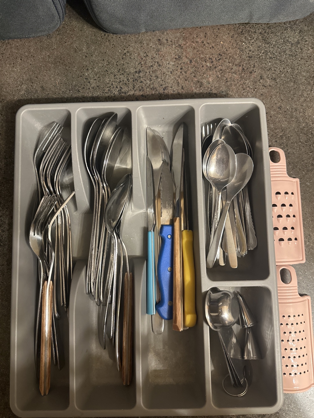 Assorted cutlery with container