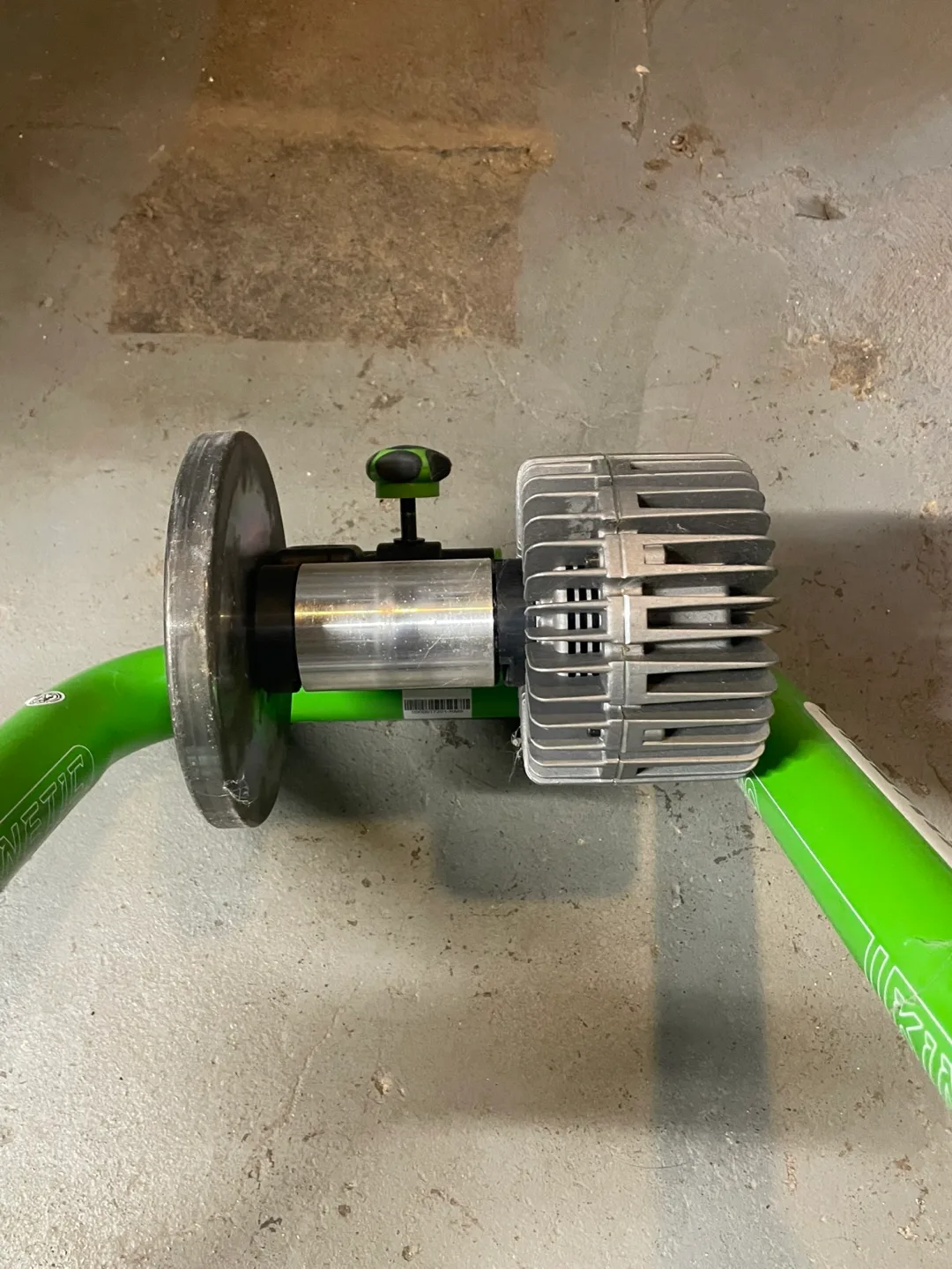 Kinetic Fluid bicycle trainer and front wheel riser . image indicator(2)