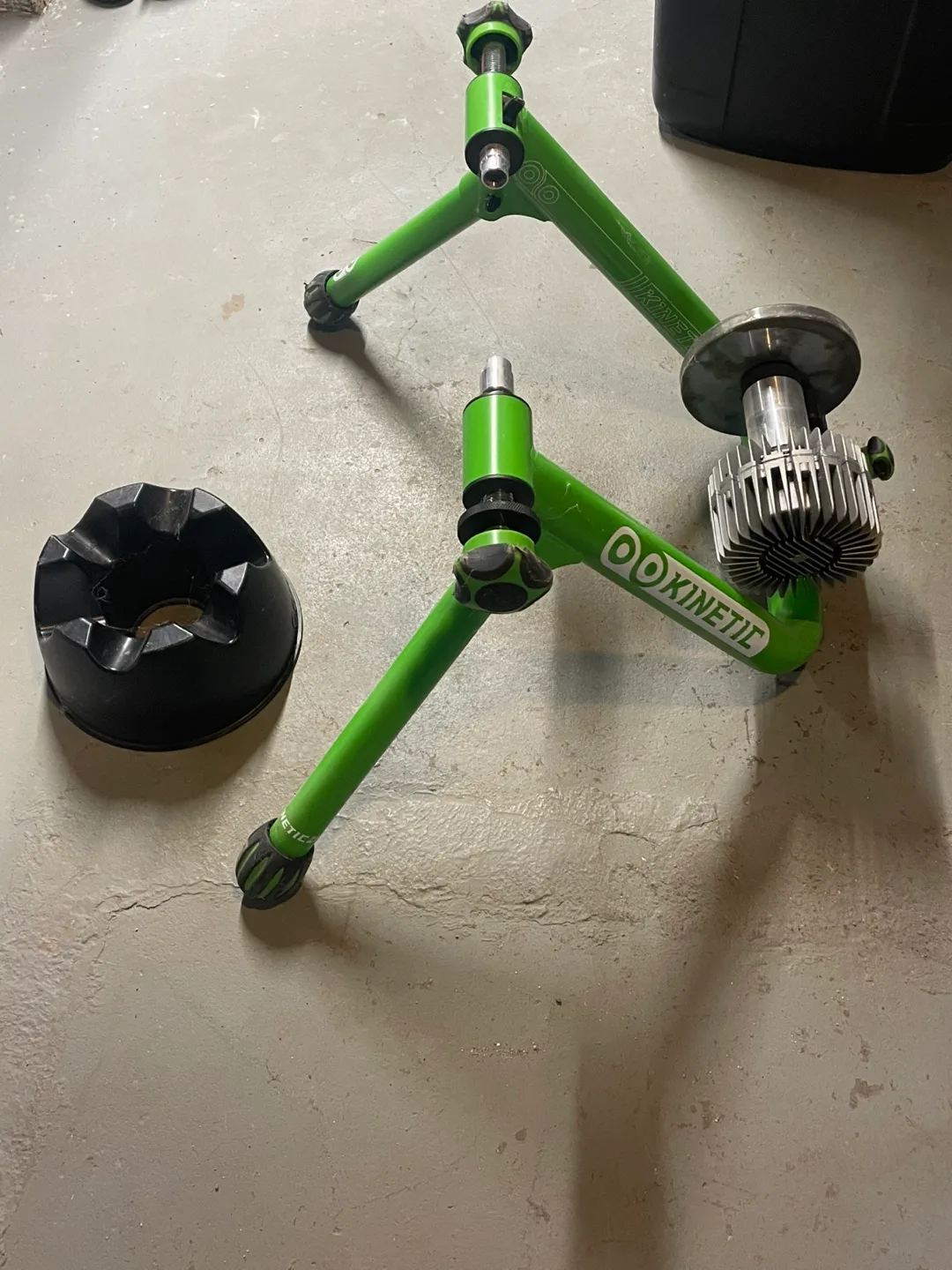 Kinetic Fluid bicycle trainer and front wheel riser . image indicator(3)