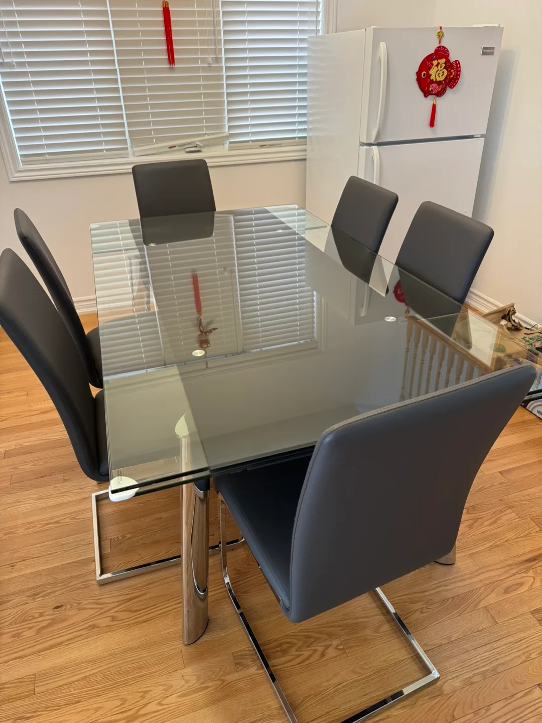 Glass dining table. Sits 6-8. Expandable. Includes 6 chairs. thumbnail