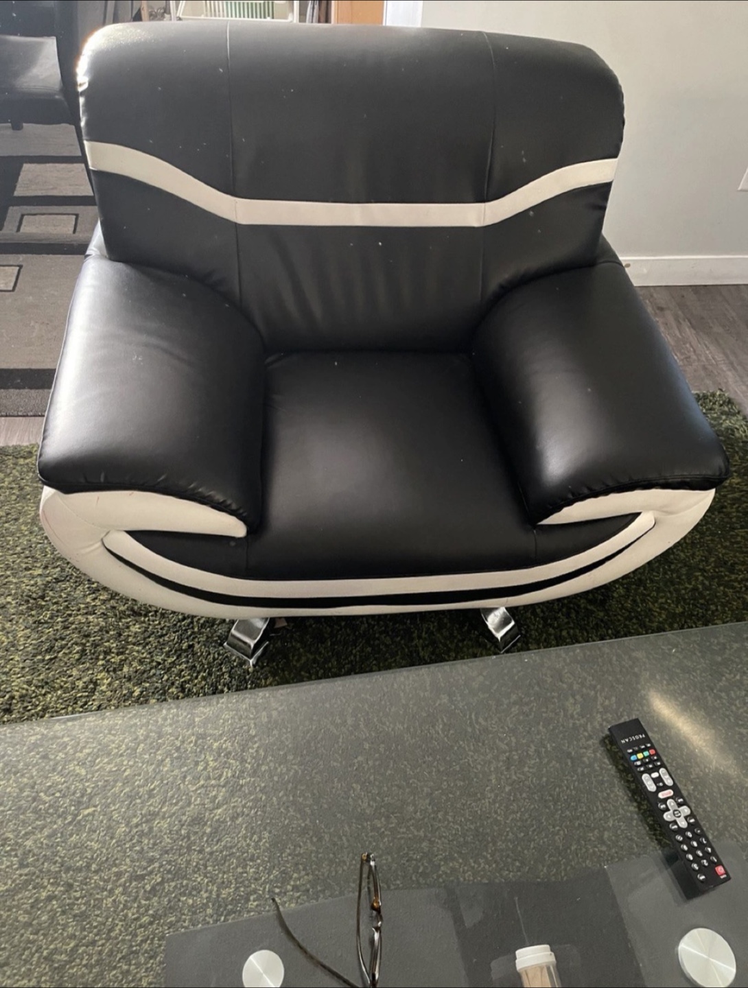 Black and white sofa and armchair set and coffee table