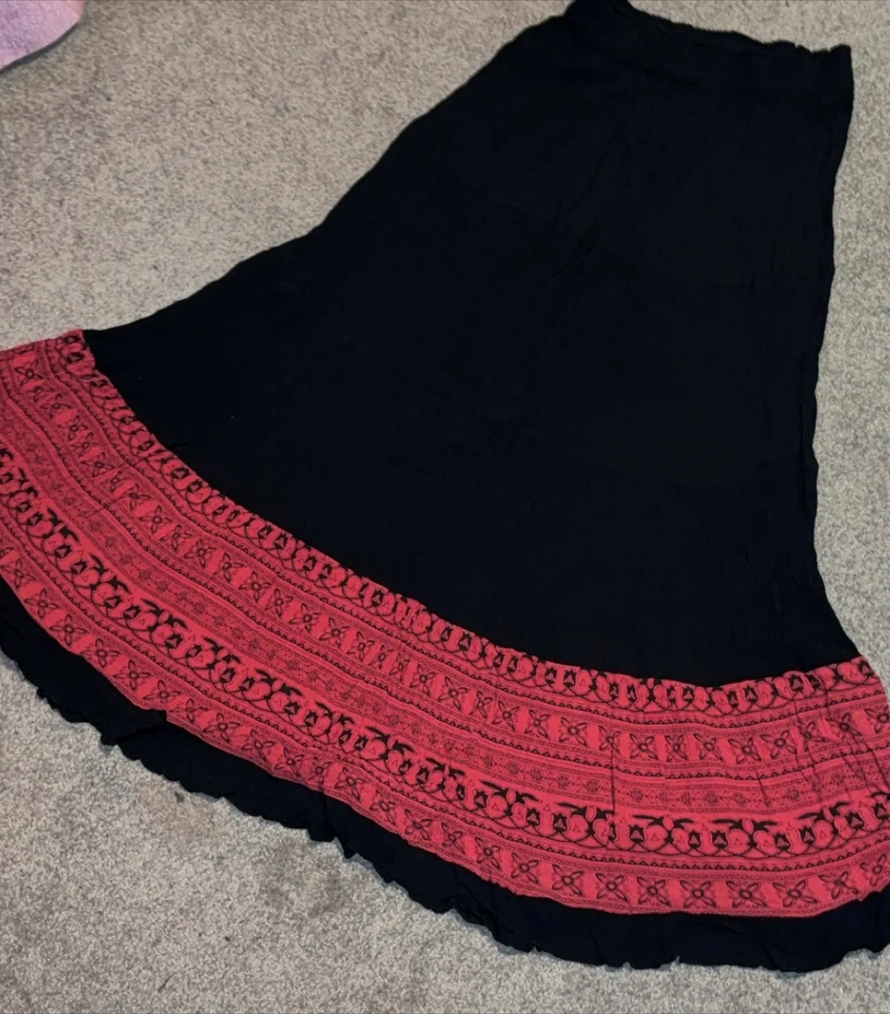 Black skirt with red patterned border thumbnail