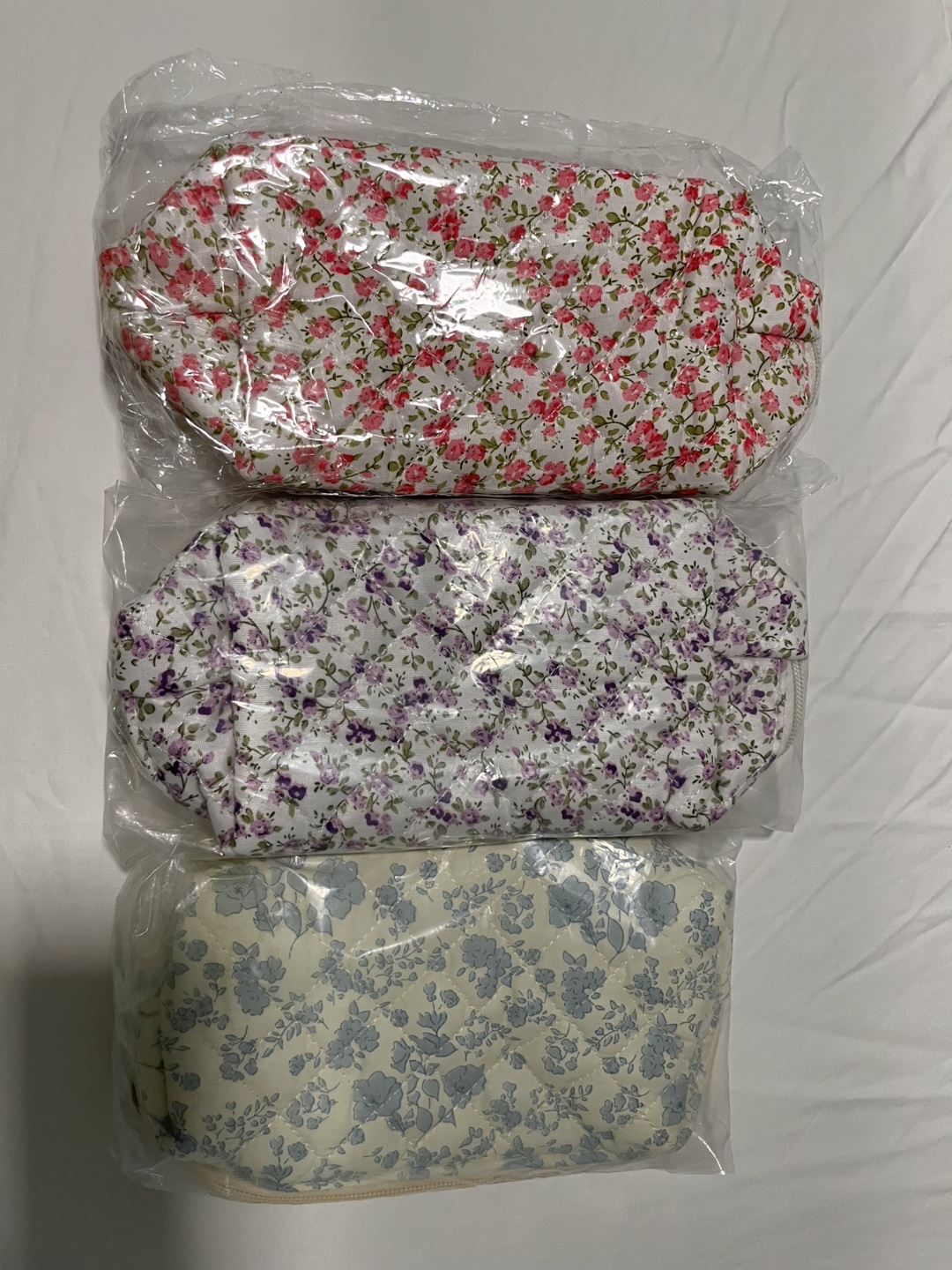 Floral quilted pouches.