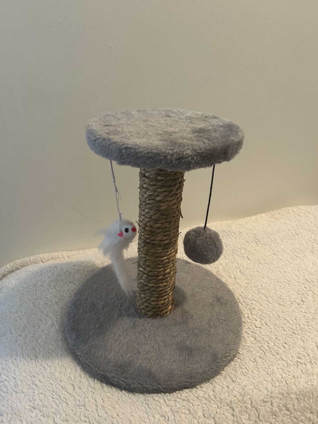 Cat scratch post with toys
