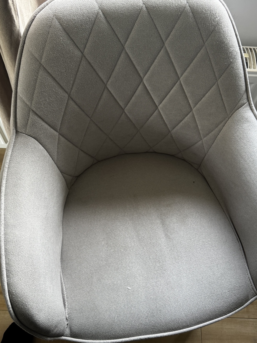 Gray Armchair with Round Pillow