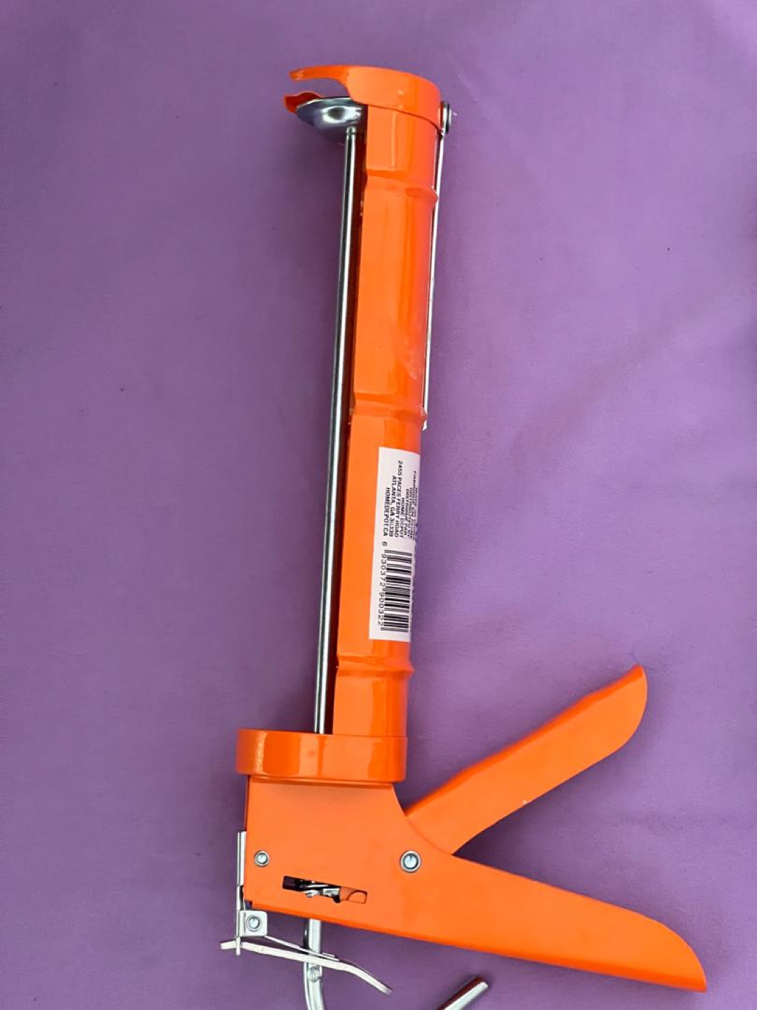 Orange Caulk Gun