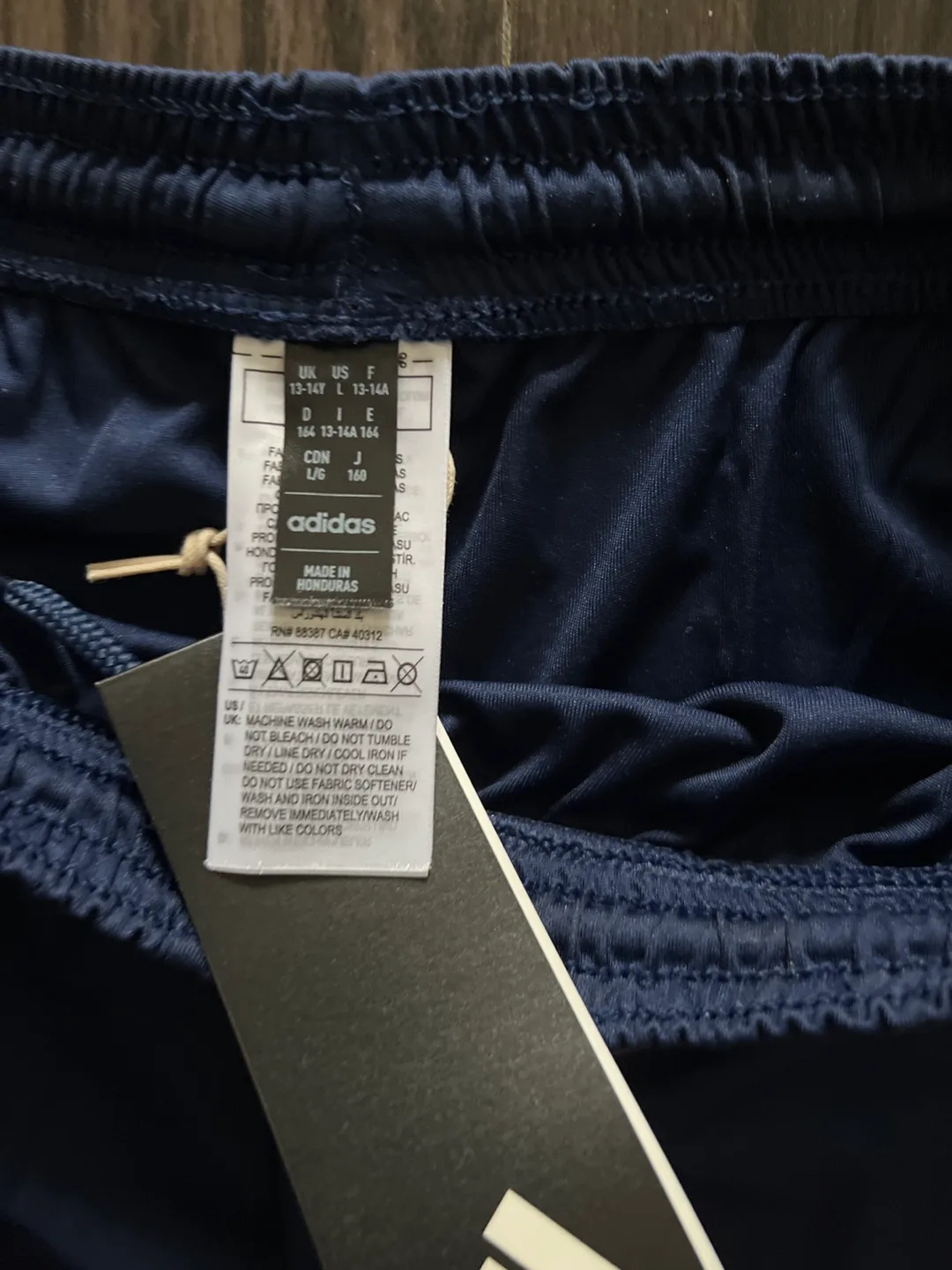 Adidas Navy Blue Shorts With White Stripes - New with Tags image indicator(2)