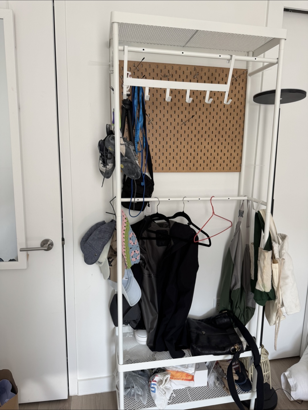 White Metal Clothing Rack with Pegboard