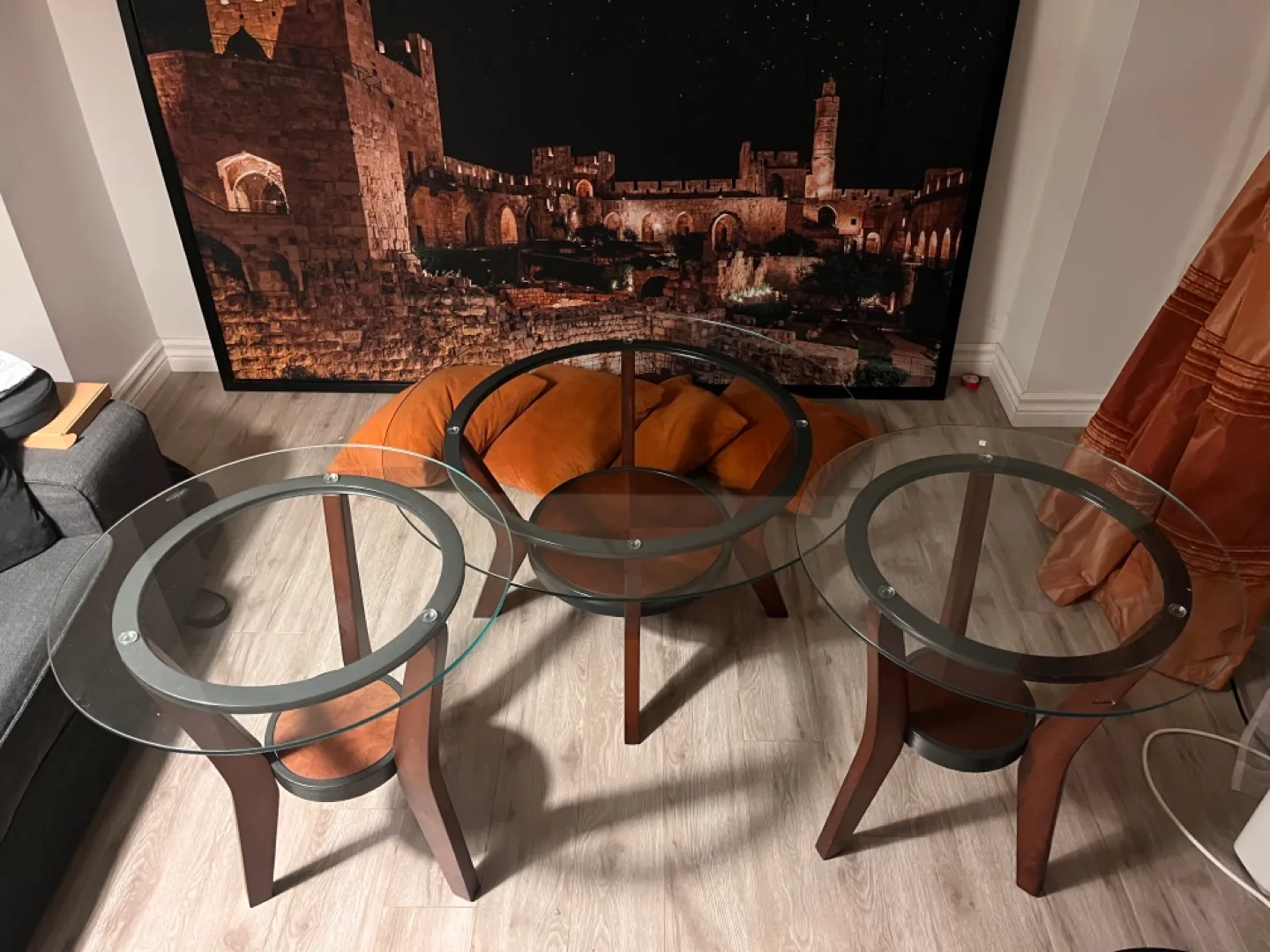 Set of three nesting glass top coffee tables thumbnail