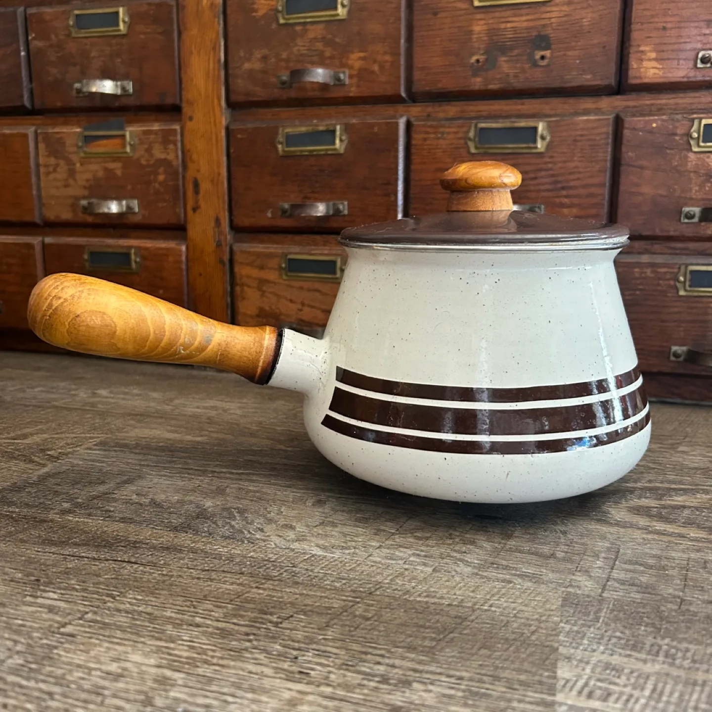 Vintage speckled enamel saucepan with wooden handle thumbnail