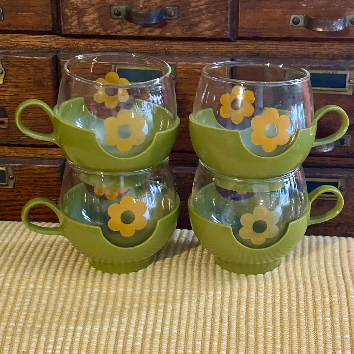 1970s Avocado Green & Orange Daisies Glass & Plastic Pyrex Mugs thumbnail