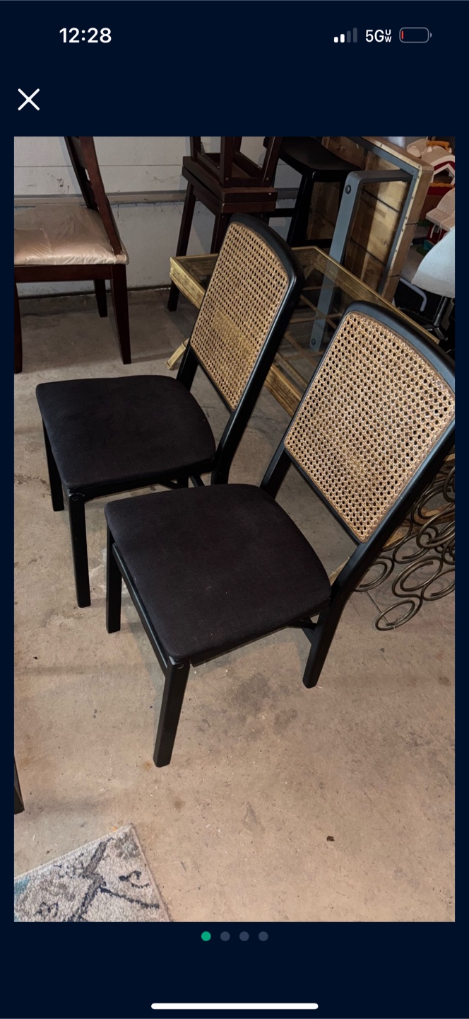 2 folding wood chairs. Like new