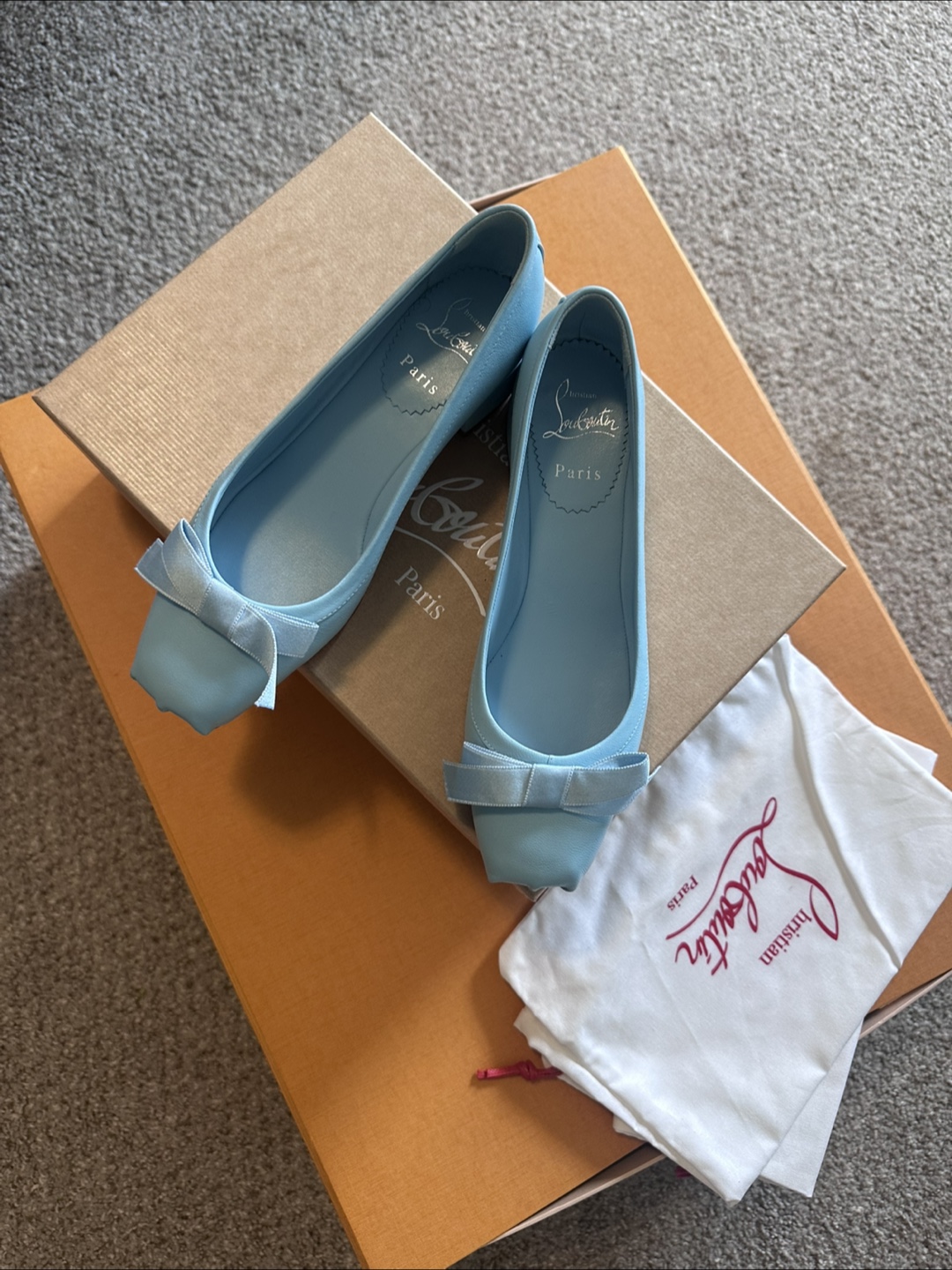 Louboutin ballet flat (1.5” heel) with bow