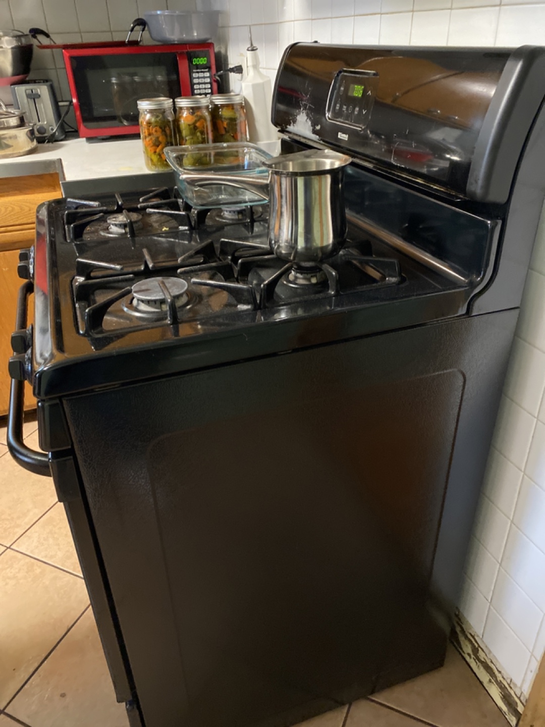 Black Stove, Microwave, and Refrigerator Bundle