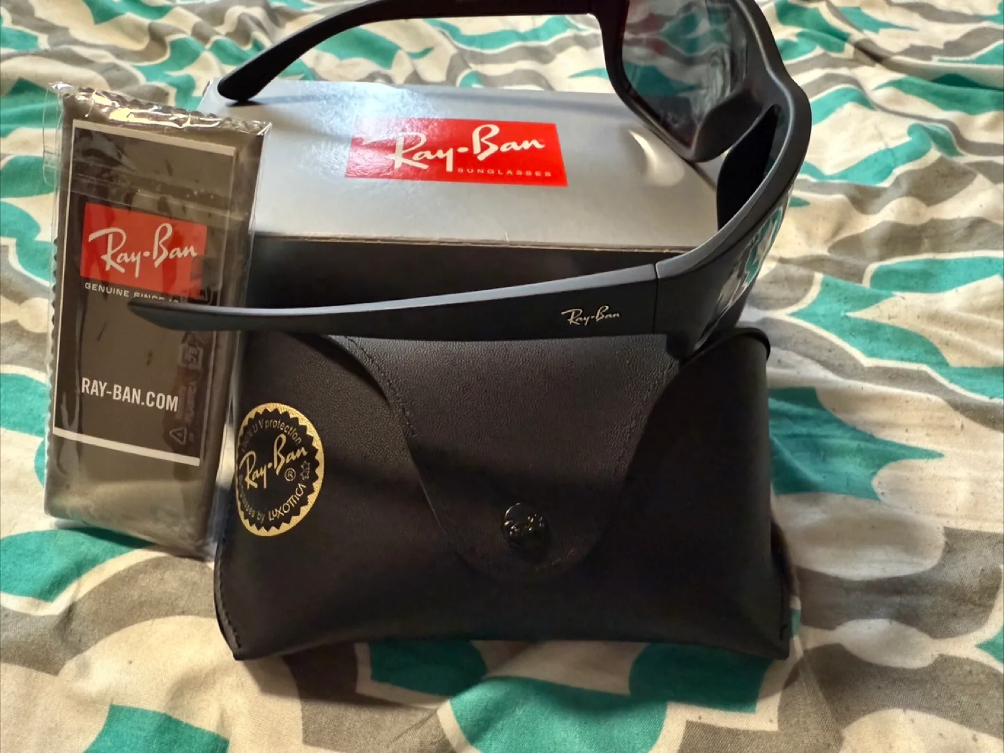 Ray-Ban (0RB4300) Sunglasses with Case and Accessories image indicator(4)