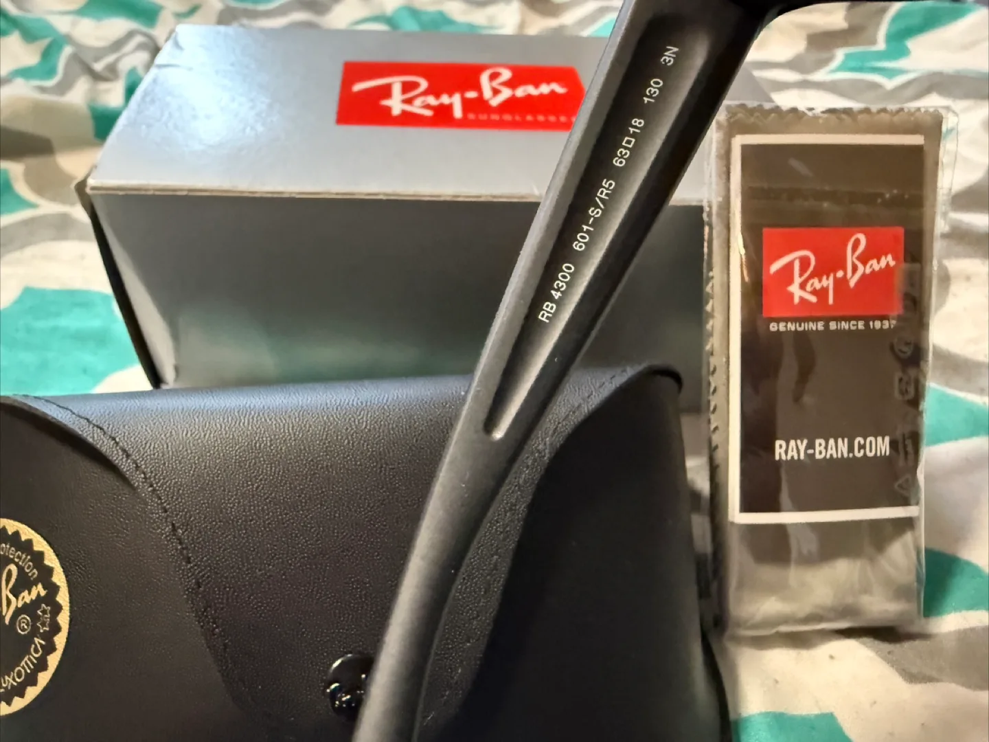 Ray-Ban (0RB4300) Sunglasses with Case and Accessories image indicator(3)