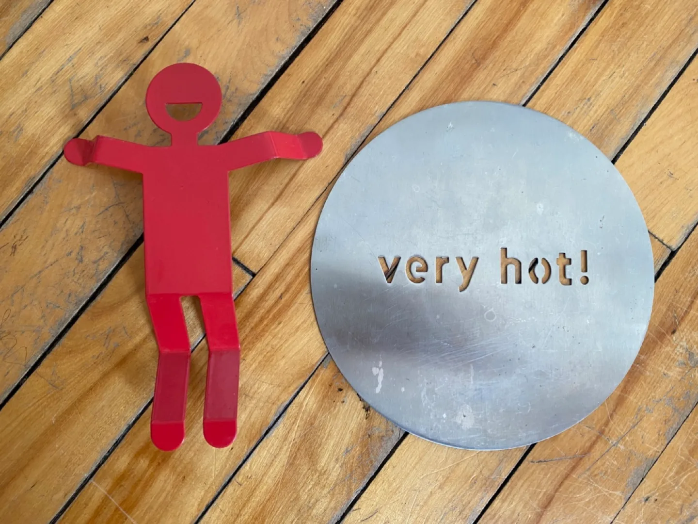 Red Figure and 'Very Hot!' Trivet thumbnail