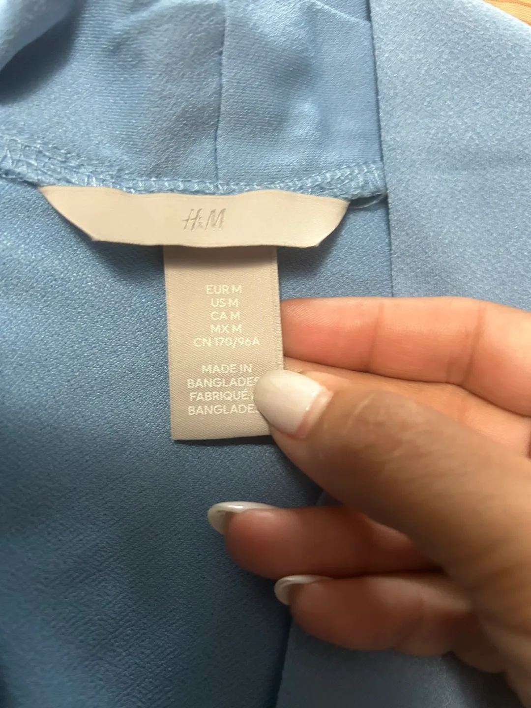 H&M Striped and Blue Tops bundle of two image indicator(3)