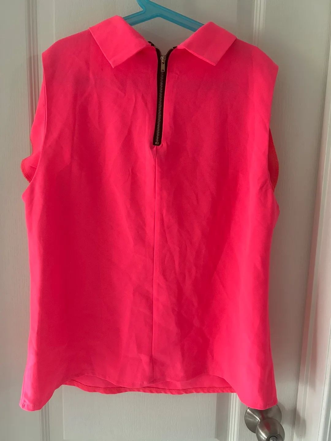 Striking Pink Sleeveless Blouse image indicator(2)