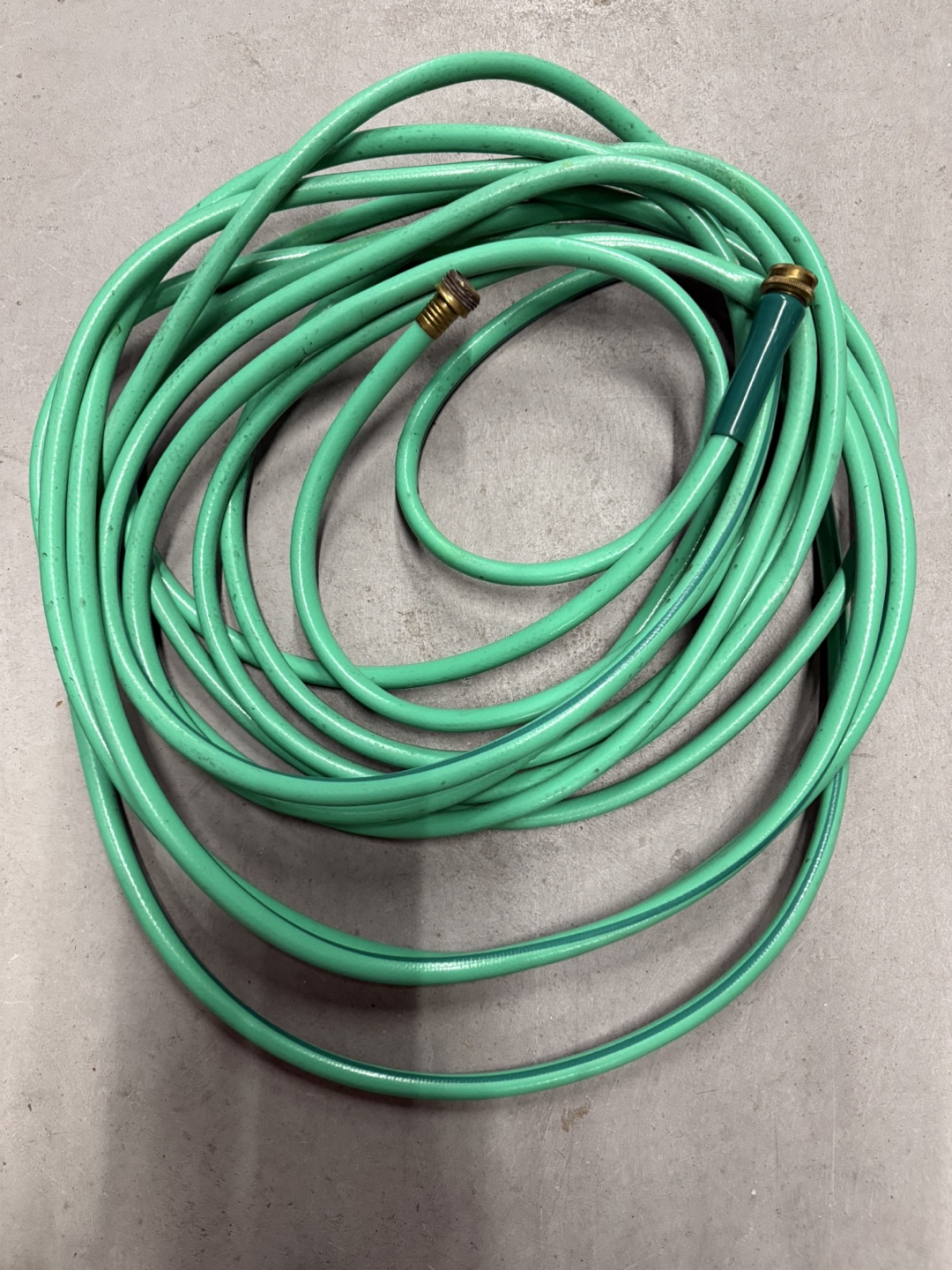 Green Garden Hose with Nozzle
