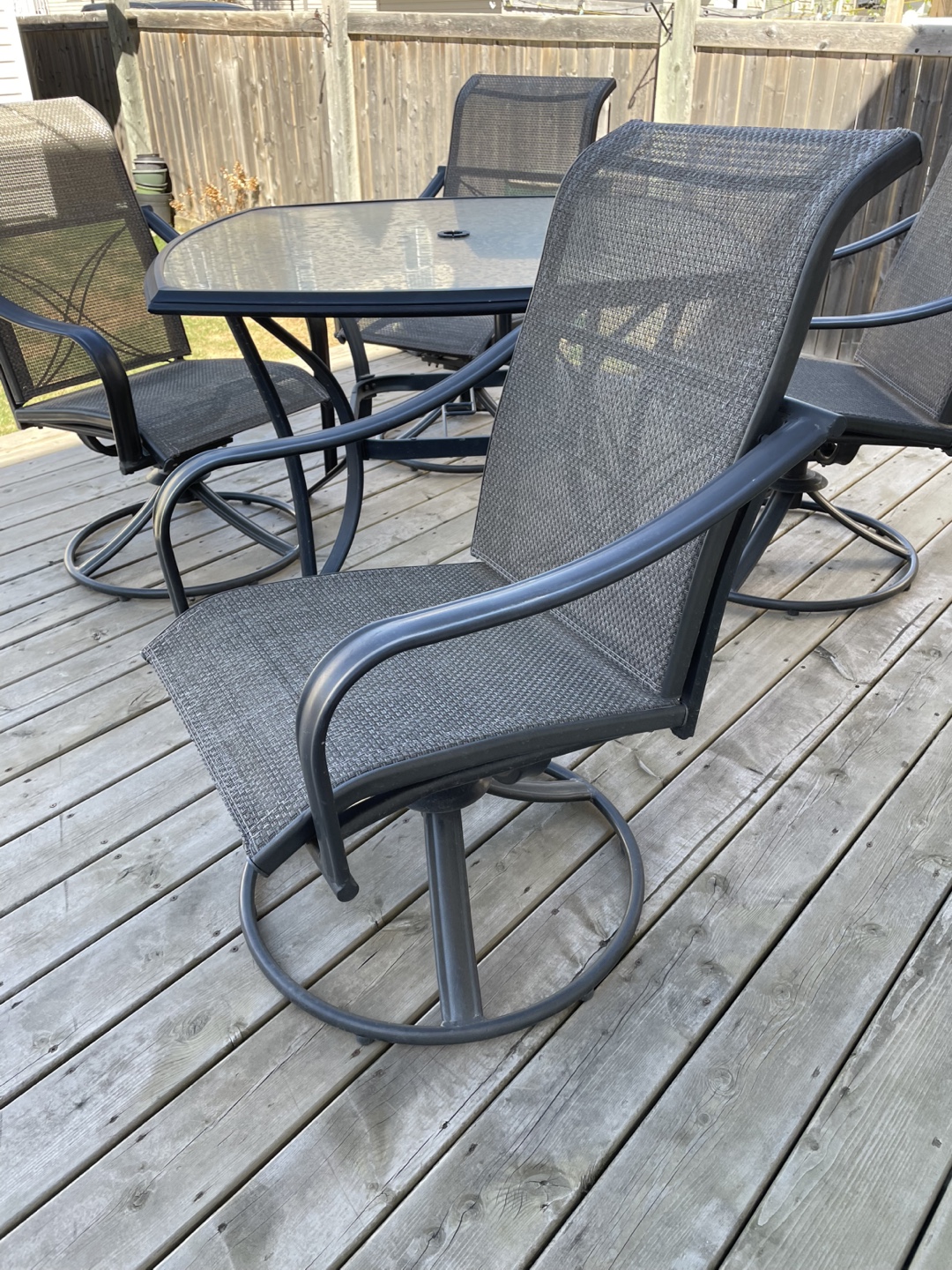 Martha Stewart patio set, table and four swivel rocking chairs