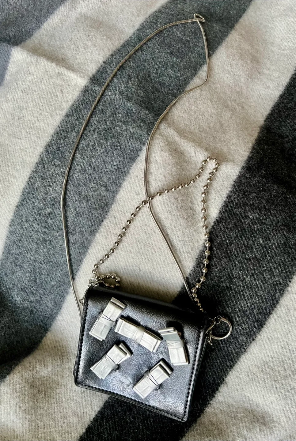 Mini crossbody bag with bow accents thumbnail