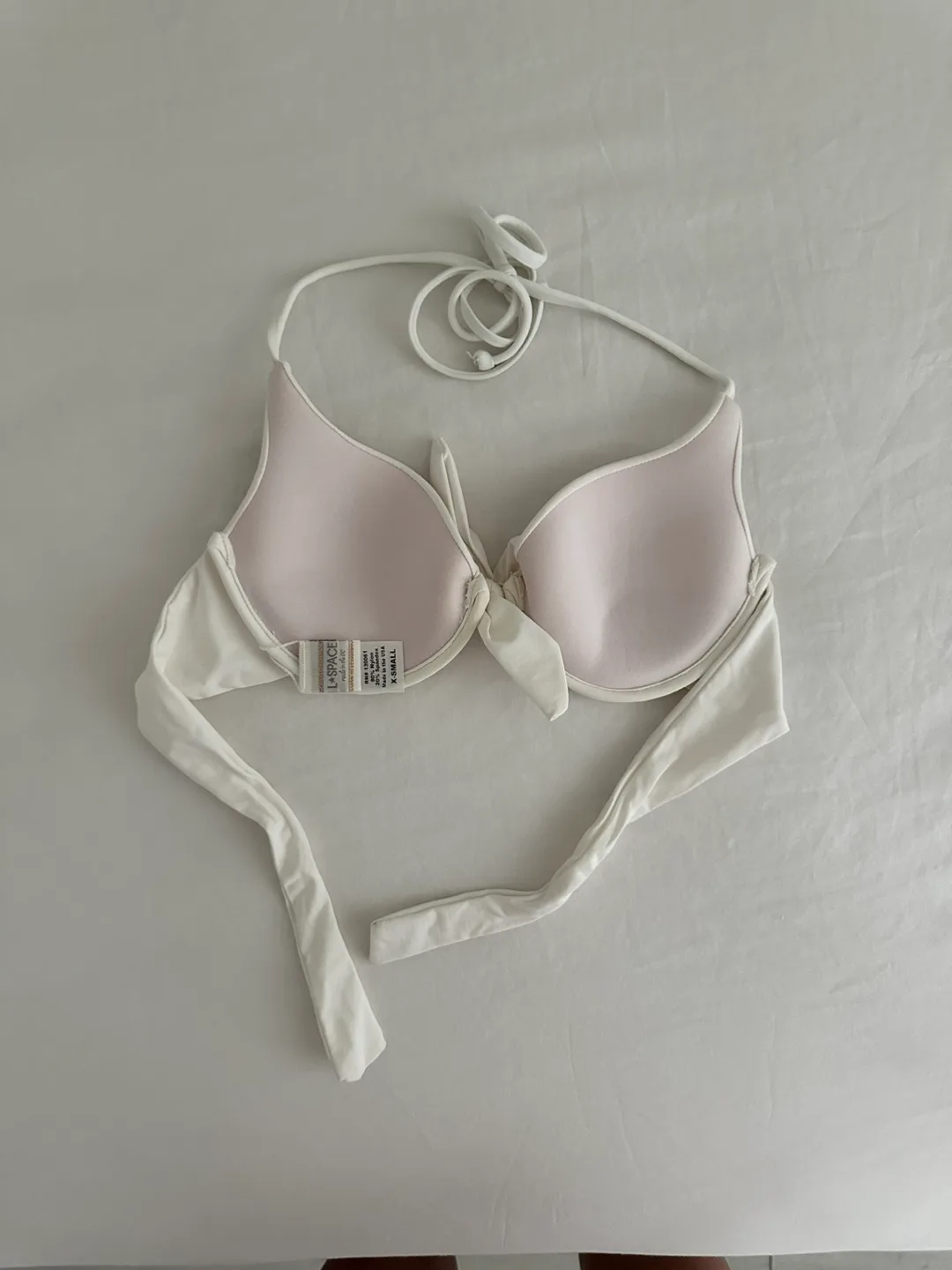 Selling brand new white LSPACE bikini top in size XS image indicator(2)
