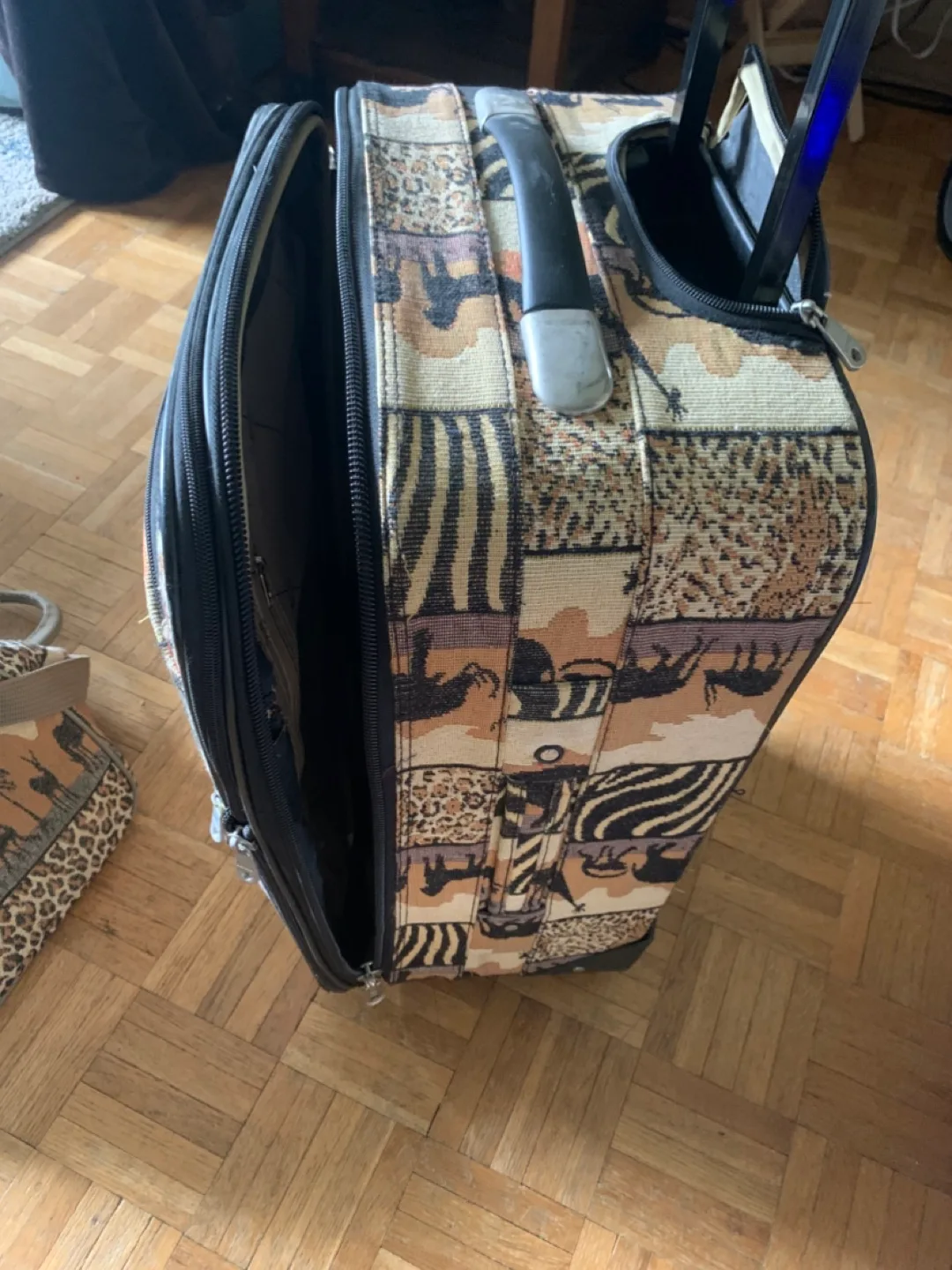 Matching Luggage Set with Animal Print thumbnail