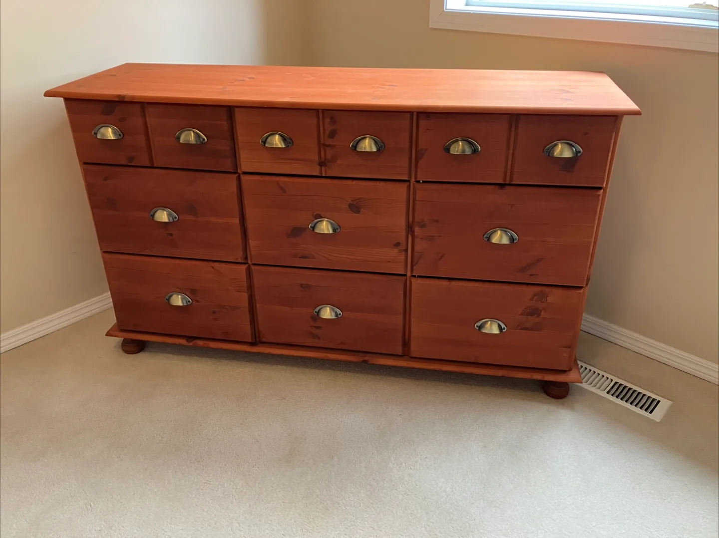 Wooden Dresser with Multiple Drawers thumbnail