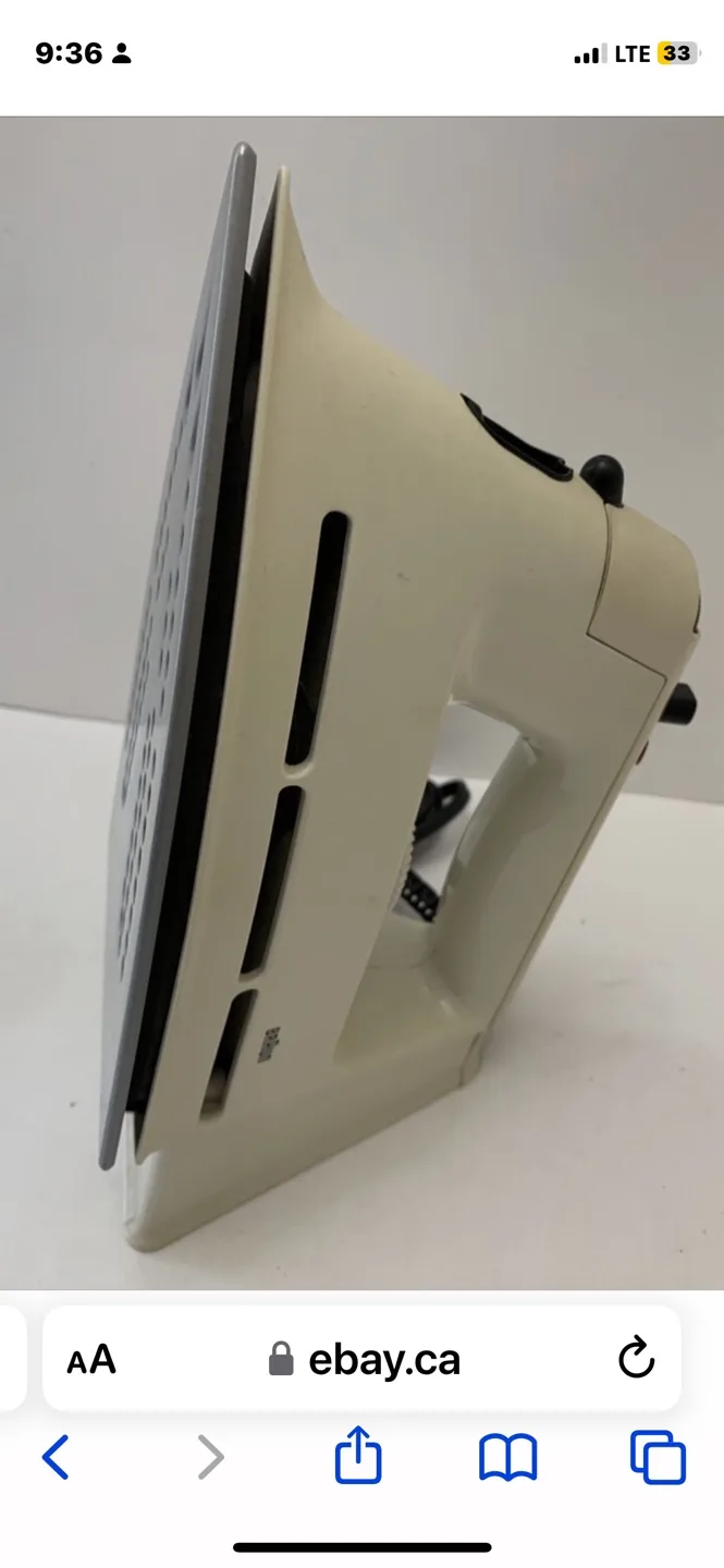 Braun iron and Ironing Board. image indicator(6)