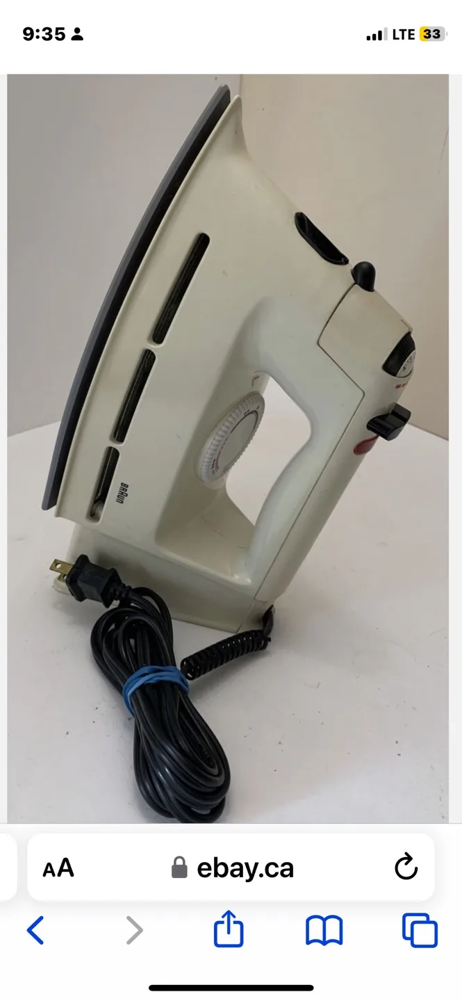 Braun iron and Ironing Board. image indicator(5)