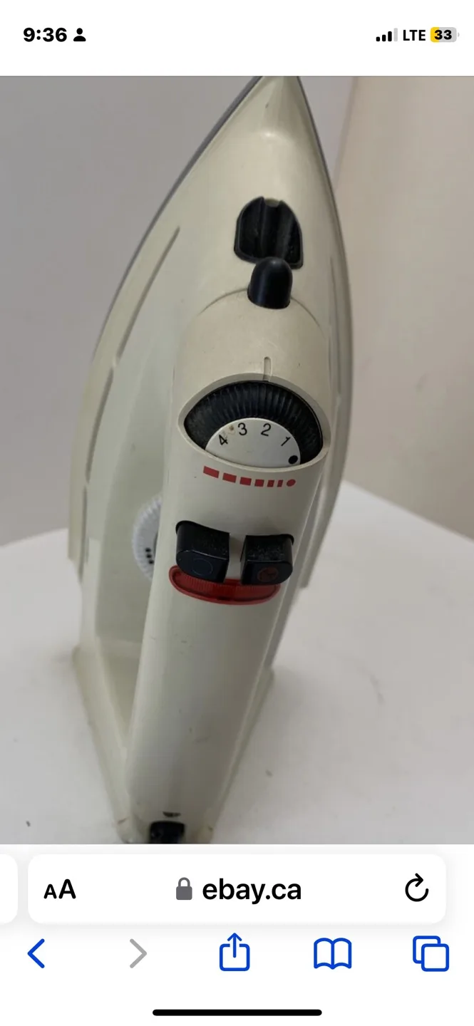 Braun iron and Ironing Board. image indicator(4)