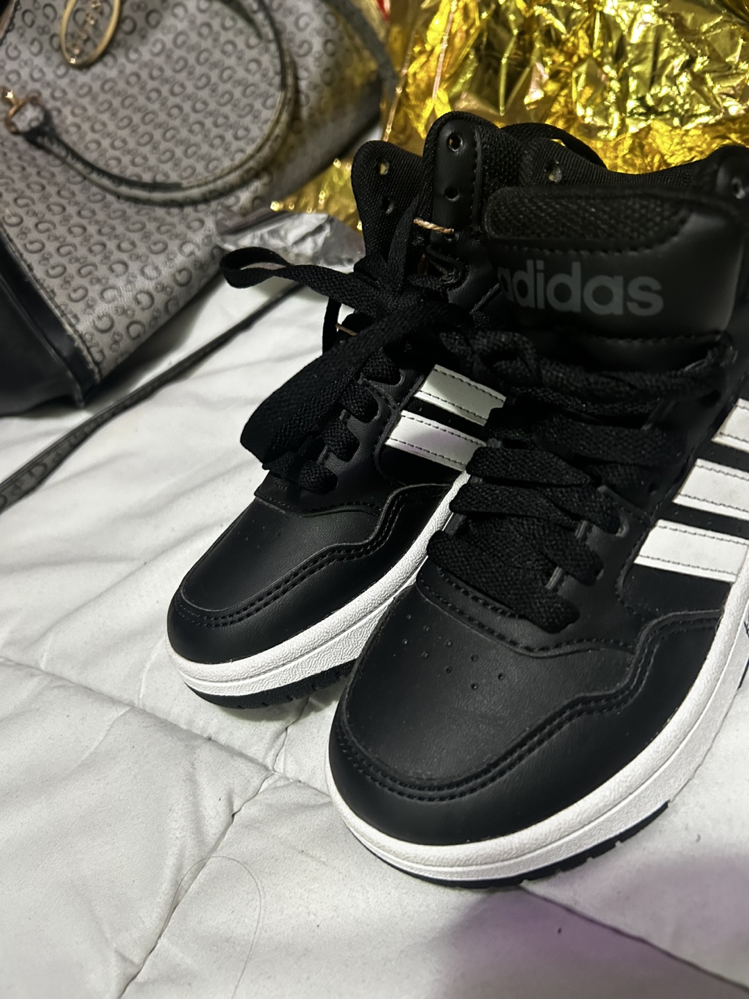 Adidas Black and White High-Top Sneakers
