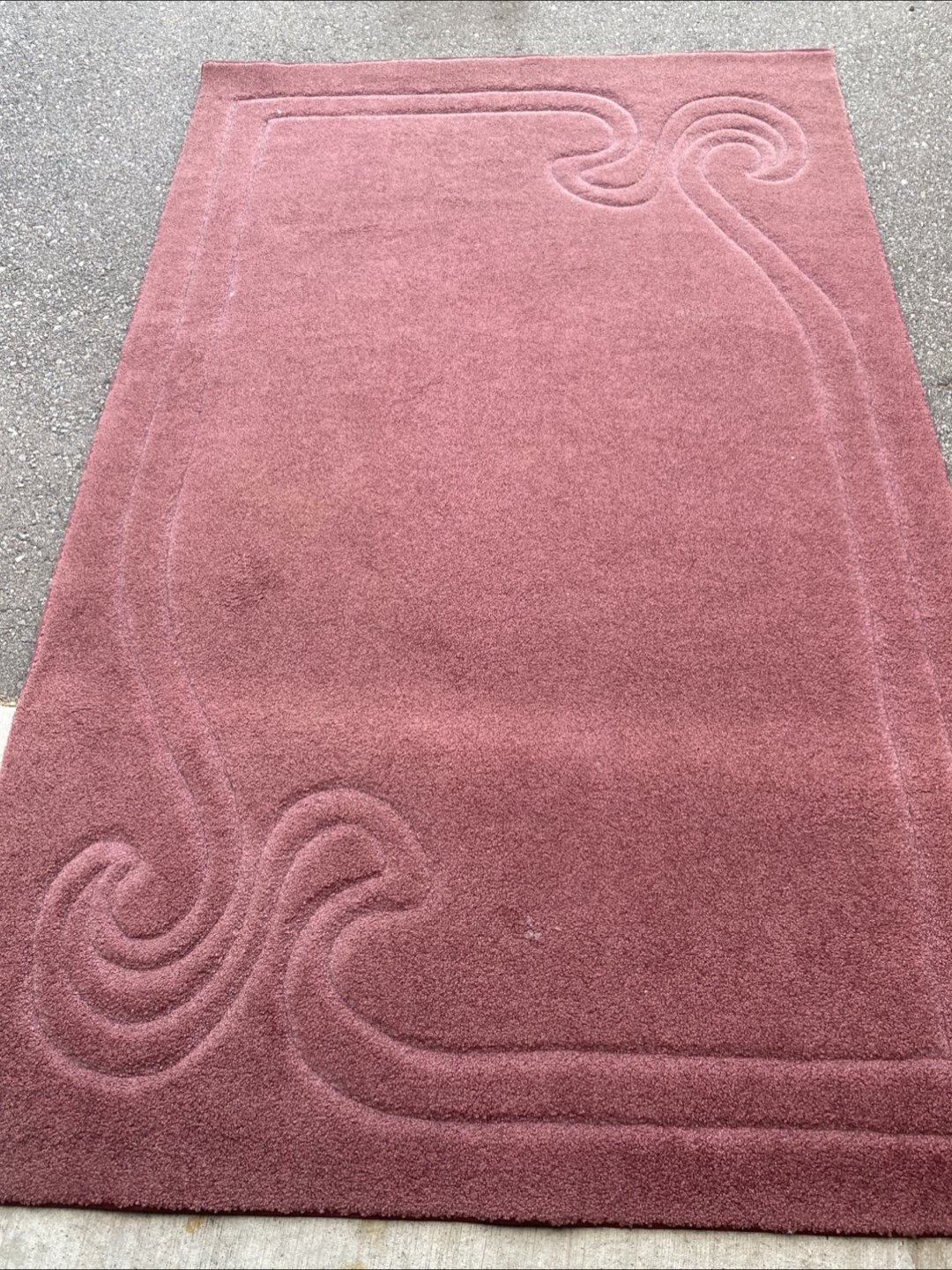 Pink Area Rug with Decorative Details