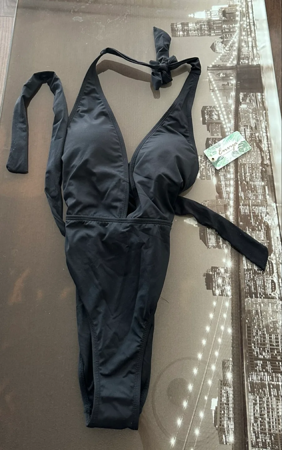 One piece bathing suit and one bathing suit top thumbnail