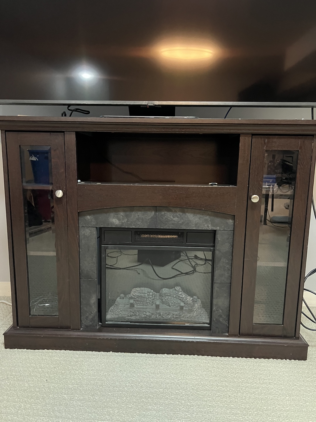 Fireplace , TV stand and book self