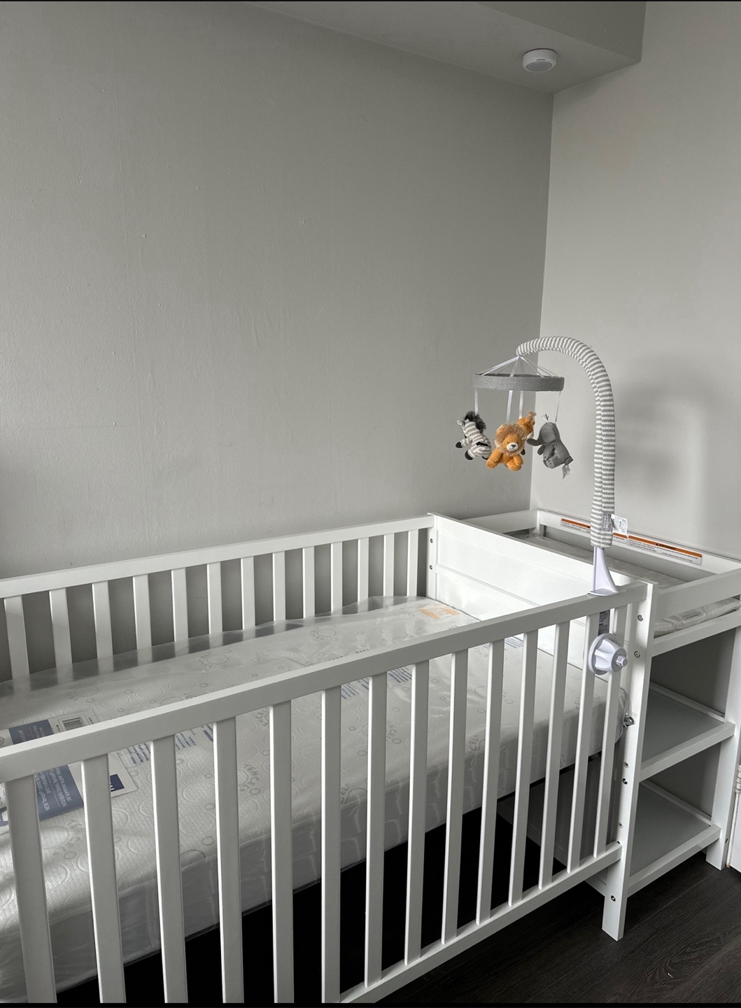 White Baby Crib with Changing Station